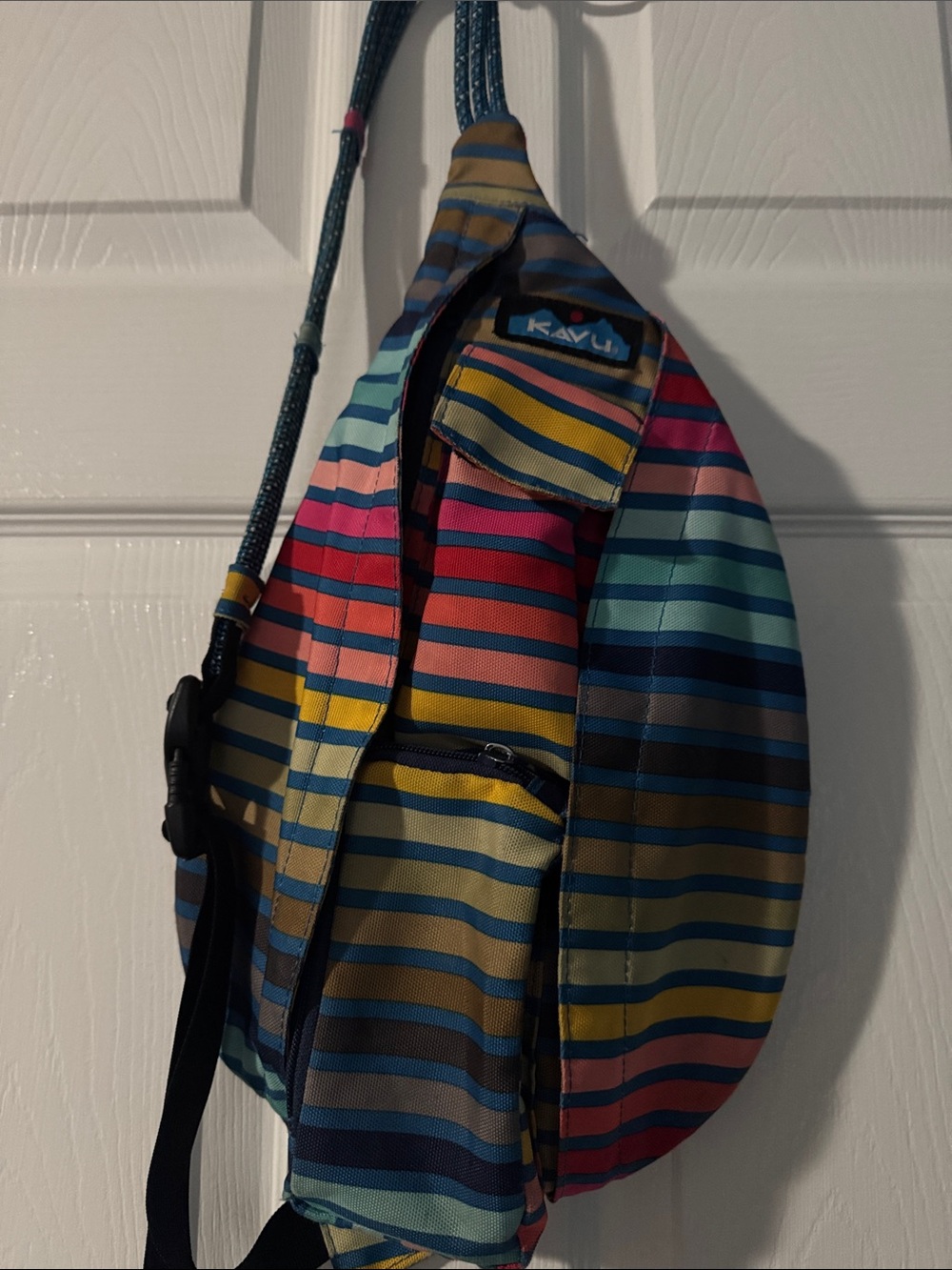 Kavu Striped Sling Belt Bag in Blue, Pink, Yellow and Green